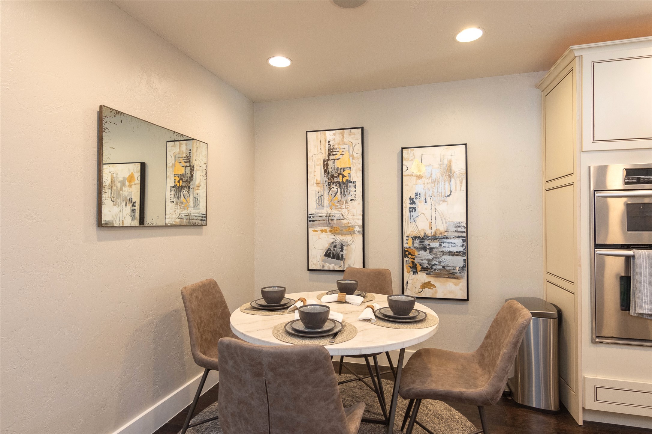 2410 Enfield Road, Unit 10 Austin, TX 78703 - Photo 11 of 40 a view of a dining room with furniture and window