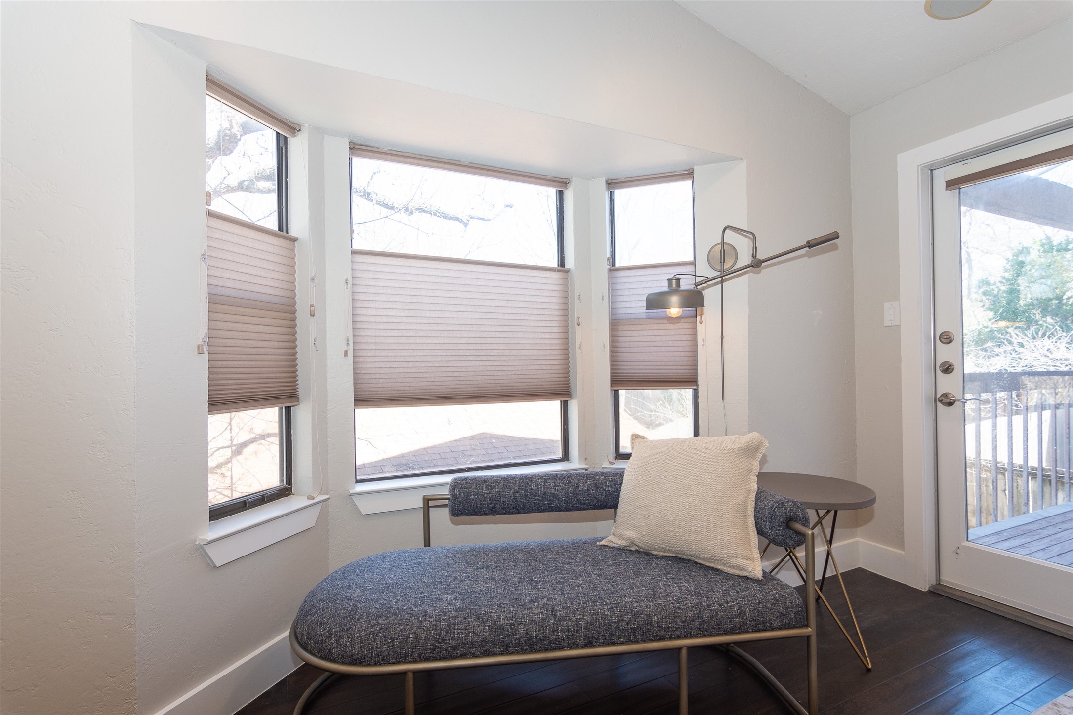 2410 Enfield Road, Unit 10 Austin, TX 78703 - Photo 22 of 40 a view of a room with furniture and wooden floor