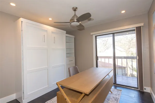 a room with a bed and a window