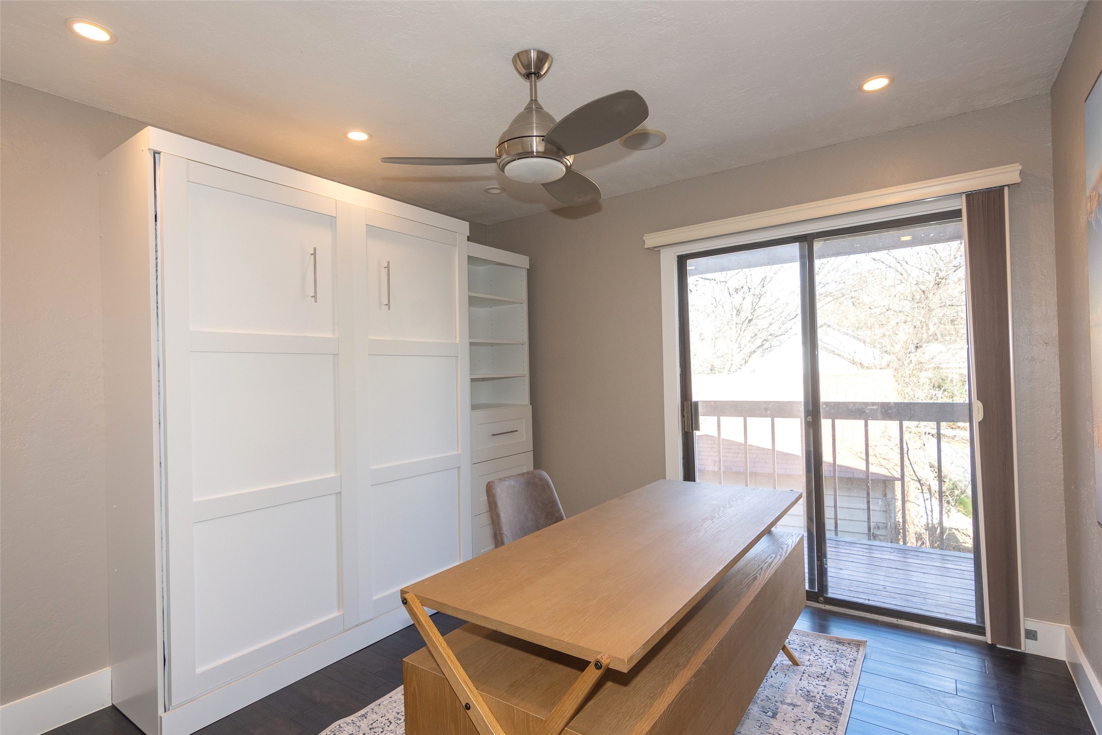 2410 Enfield Road, Unit 10 Austin, TX 78703 - Photo 30 of 40 a room with a bed and a window