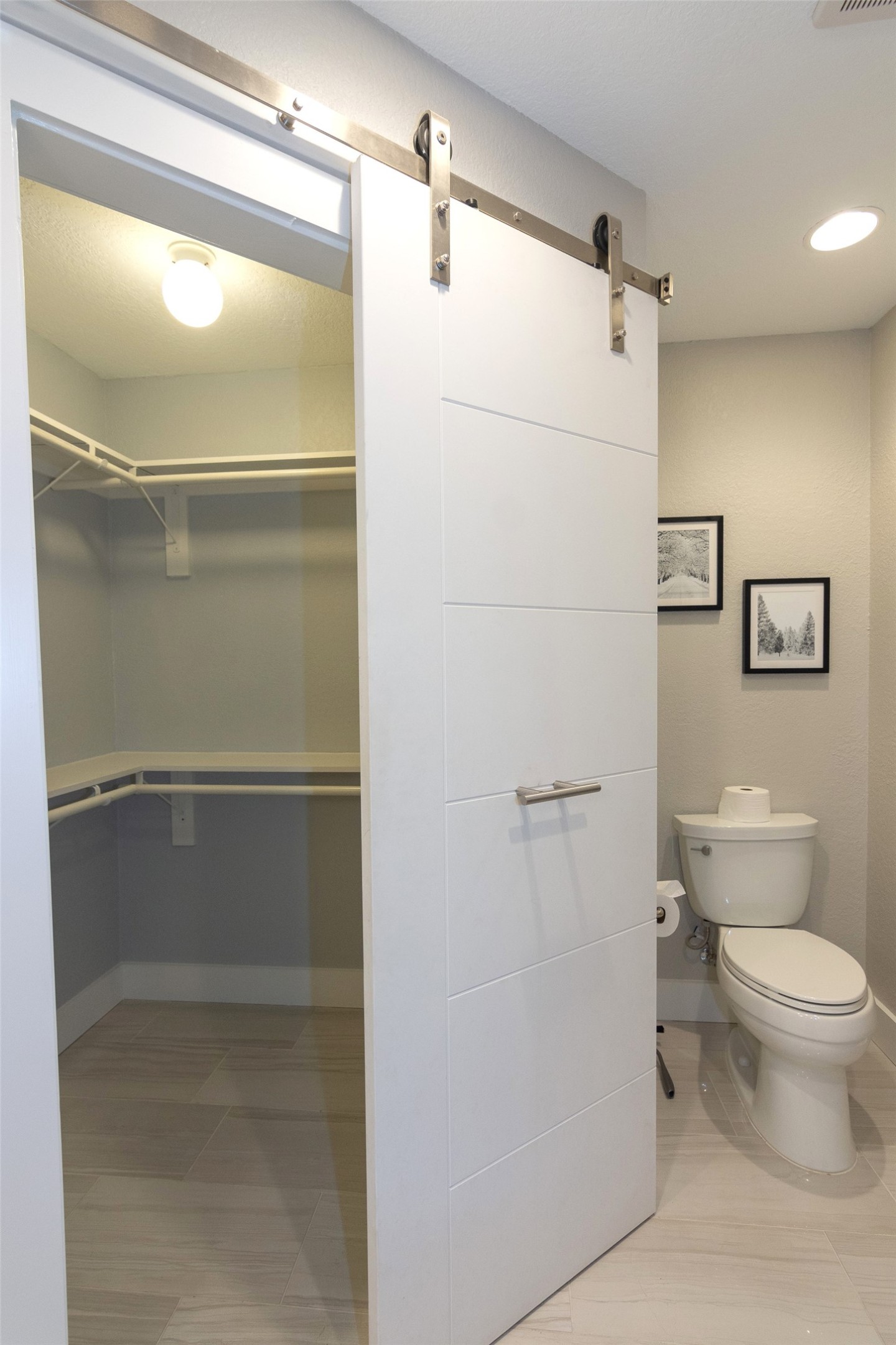 2410 Enfield Road, Unit 10 Austin, TX 78703 - Photo 39 of 40 a bathroom with a shower and a toilet