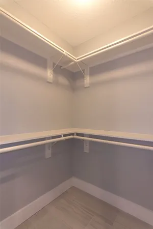 a view of a room with racks on the wall