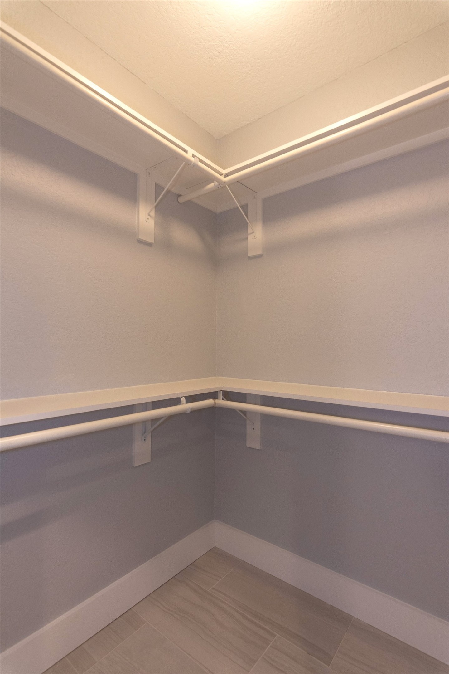 2410 Enfield Road, Unit 10 Austin, TX 78703 - Photo 40 of 40 a view of a room with racks on the wall
