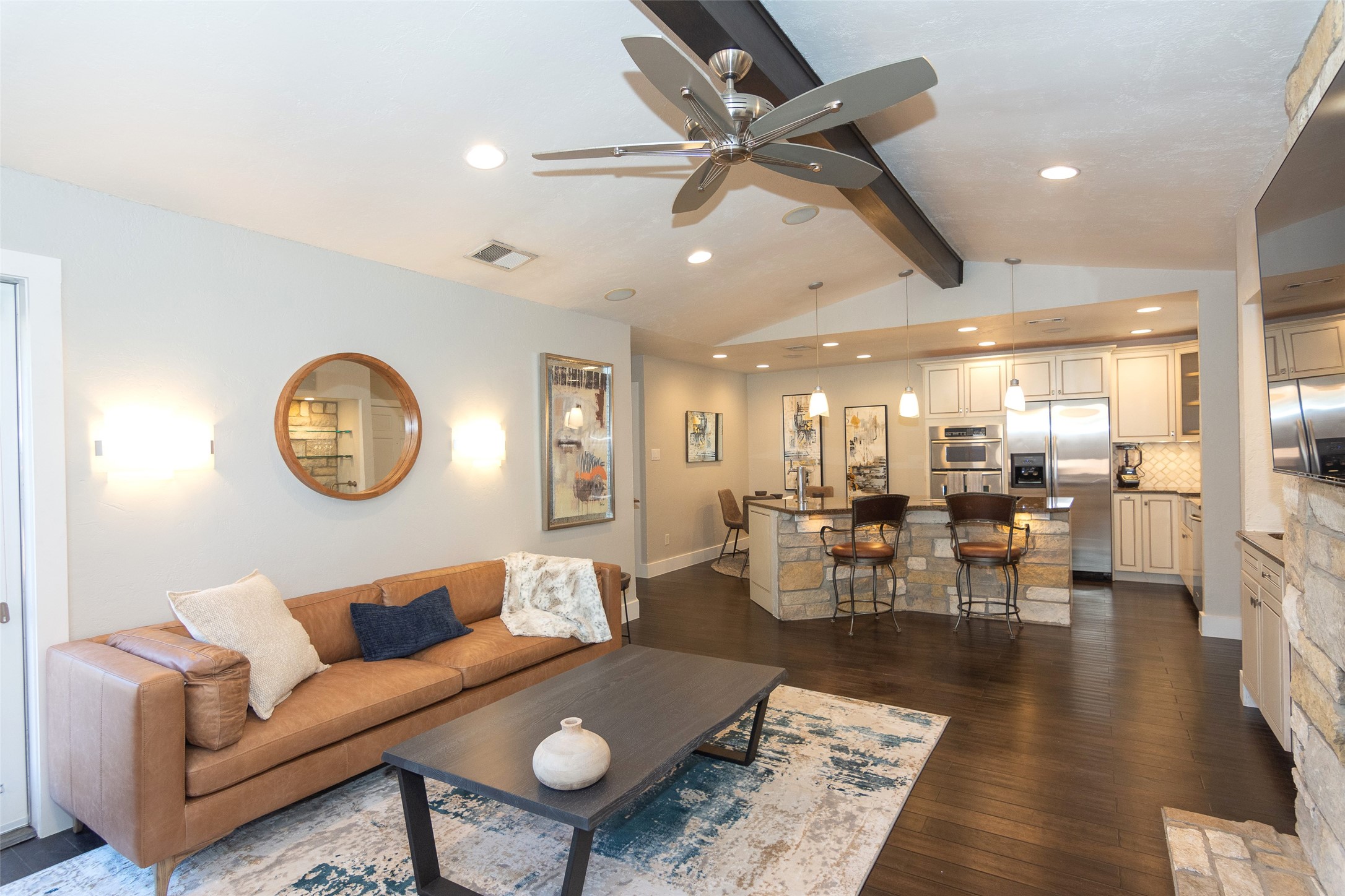 2410 Enfield Road, Unit 10 Austin, TX 78703 - Photo 5 of 40 a living room with lots of furniture and view of kitchen