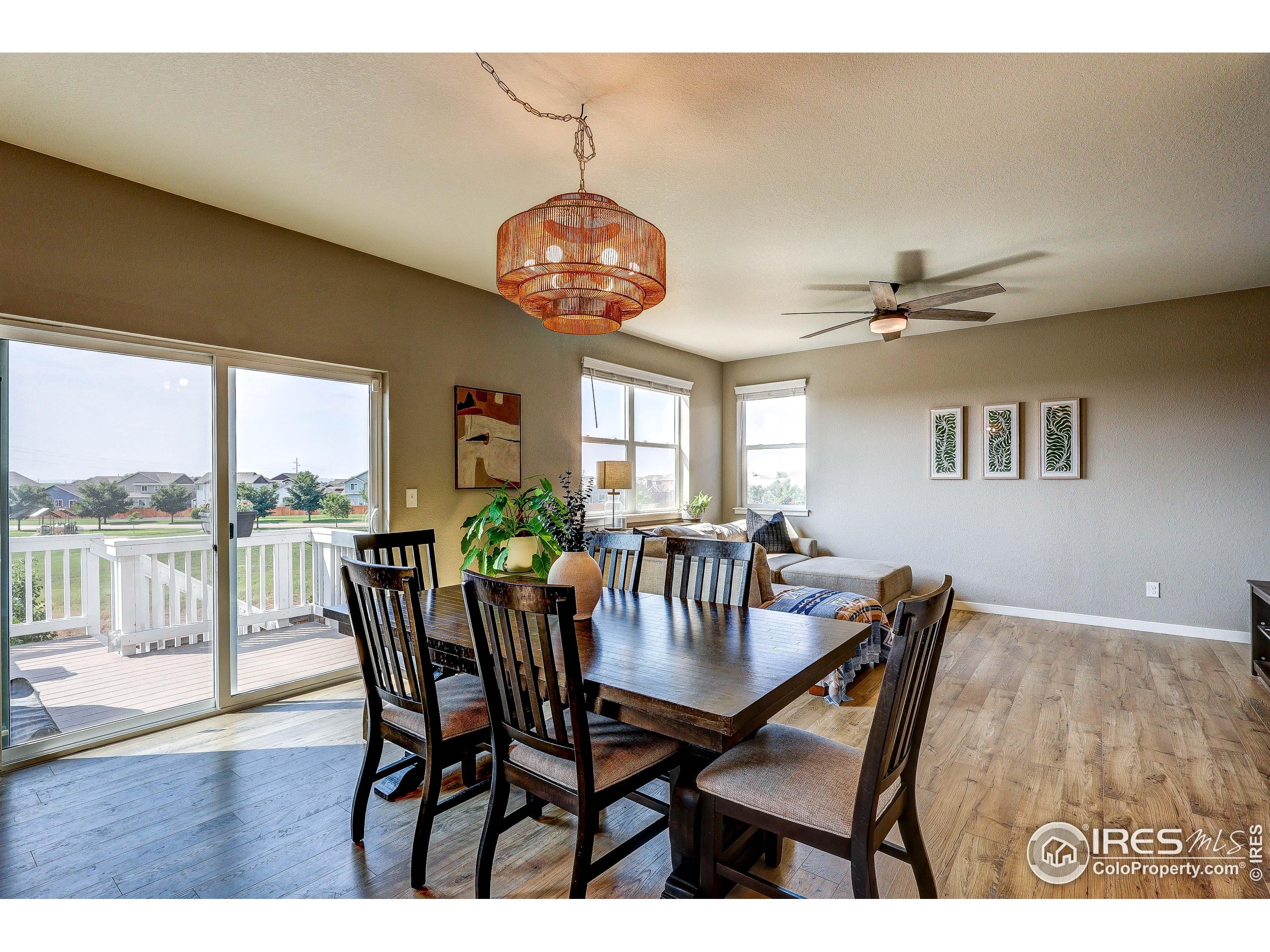 1335 Copeland Falls Road Severance, CO 80550 - Photo 11 of 40 a view of a dining room with furniture window and wooden floor