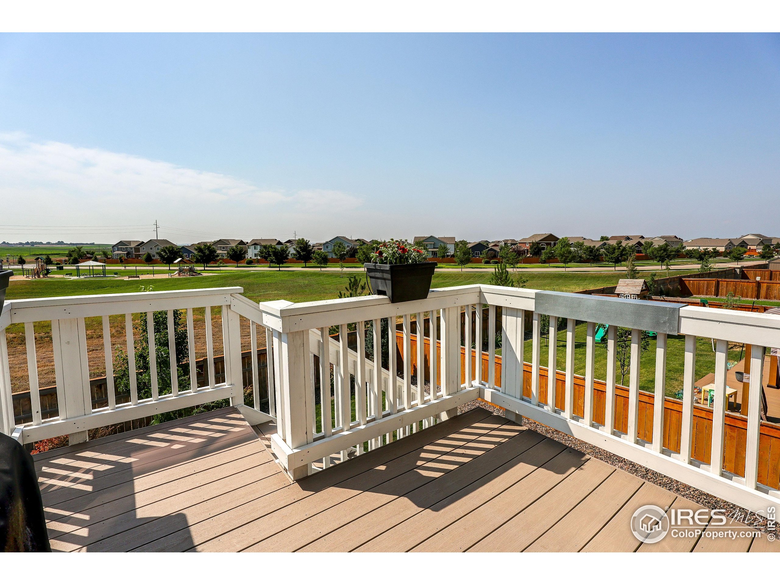 1335 Copeland Falls Road Severance, CO 80550 - Photo 18 of 40 a view of a balcony with wooden floor
