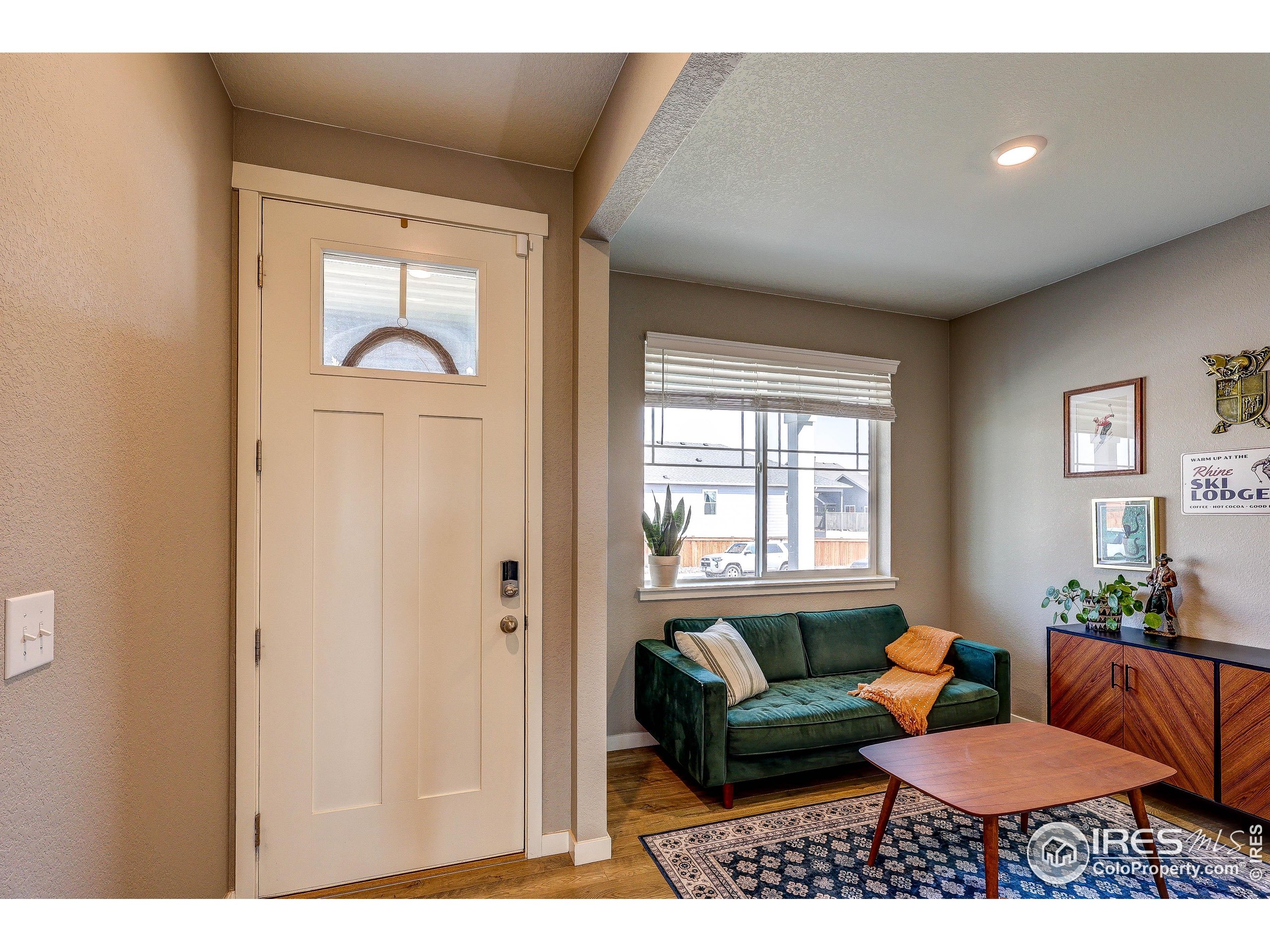 1335 Copeland Falls Road Severance, CO 80550 - Photo 3 of 40 a living room with furniture and a window