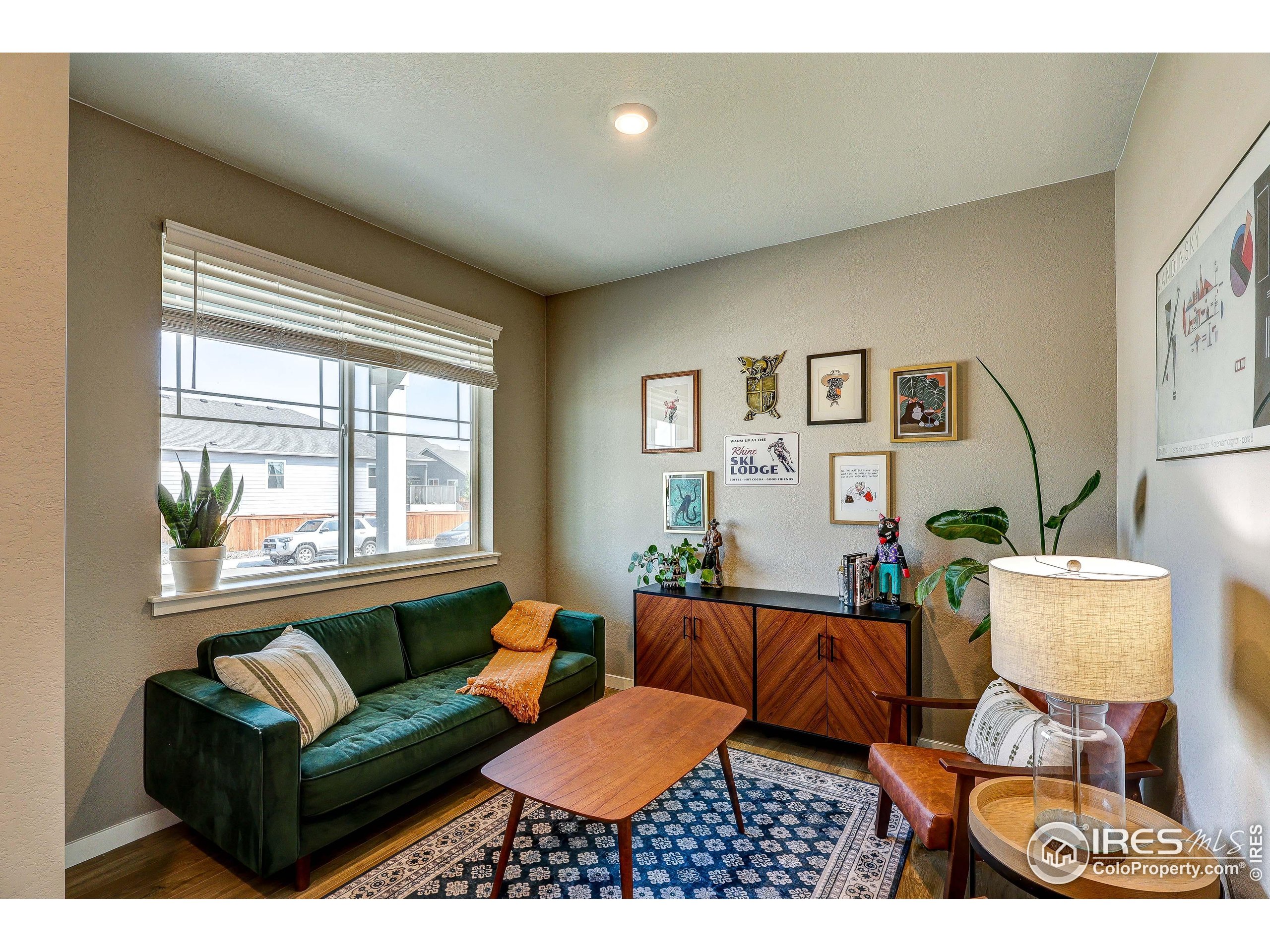 1335 Copeland Falls Road Severance, CO 80550 - Photo 5 of 40 a living room with furniture and a window