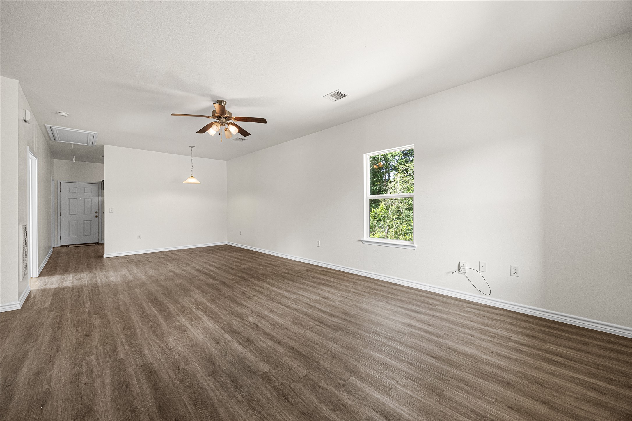 28096 7 Sisters Road, Unit A New Caney, TX 77357 - Photo 3 of 19 Open living and dining are with lots of natural light