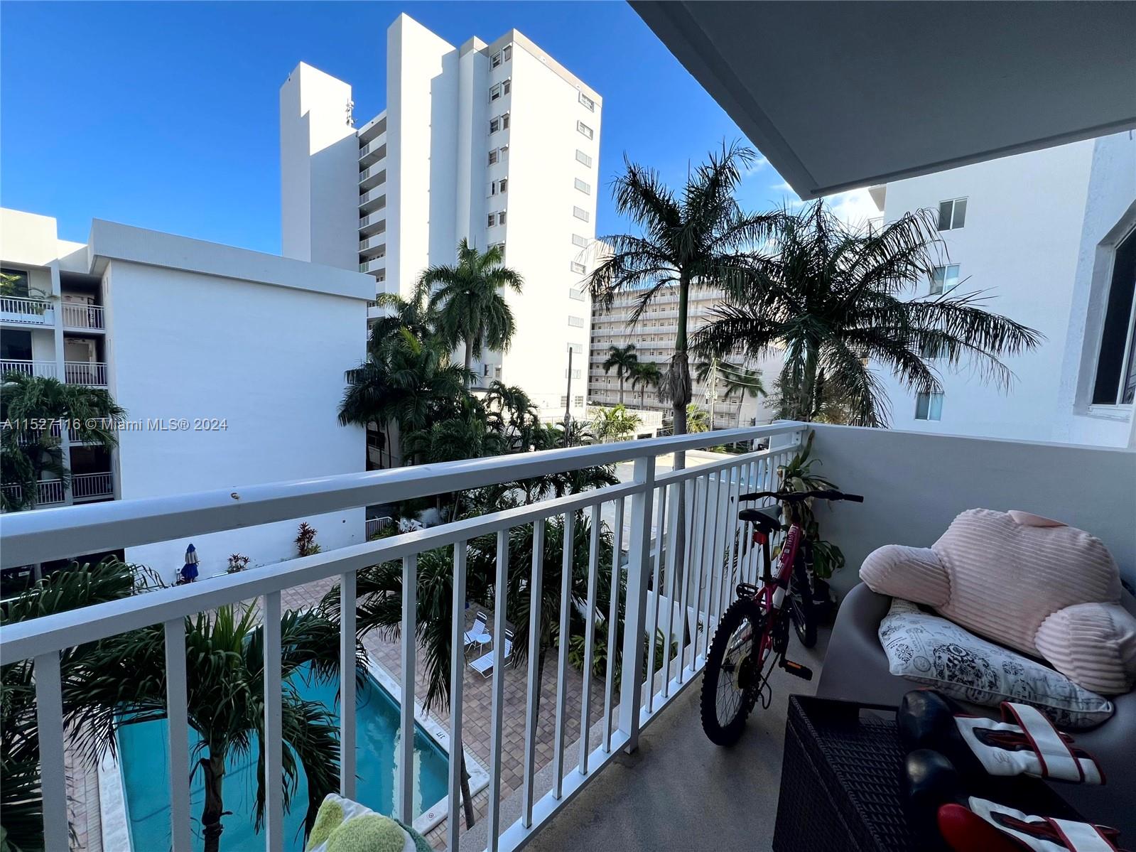 1665 Bay Road, Unit 425 Miami Beach, FL 33139 - Photo 5 of 29 a view of balcony with furniture