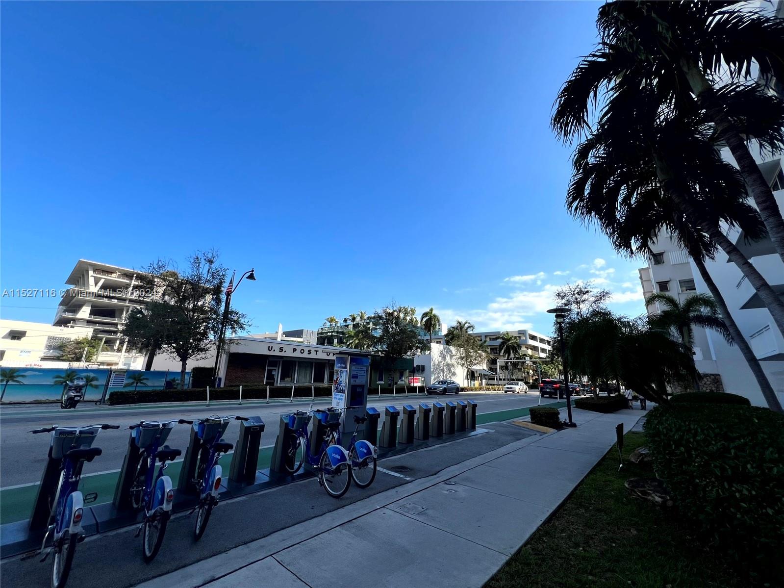 1665 Bay Road, Unit 425 Miami Beach, FL 33139 - Photo 6 of 29 a view of a chairs and table in the balcony