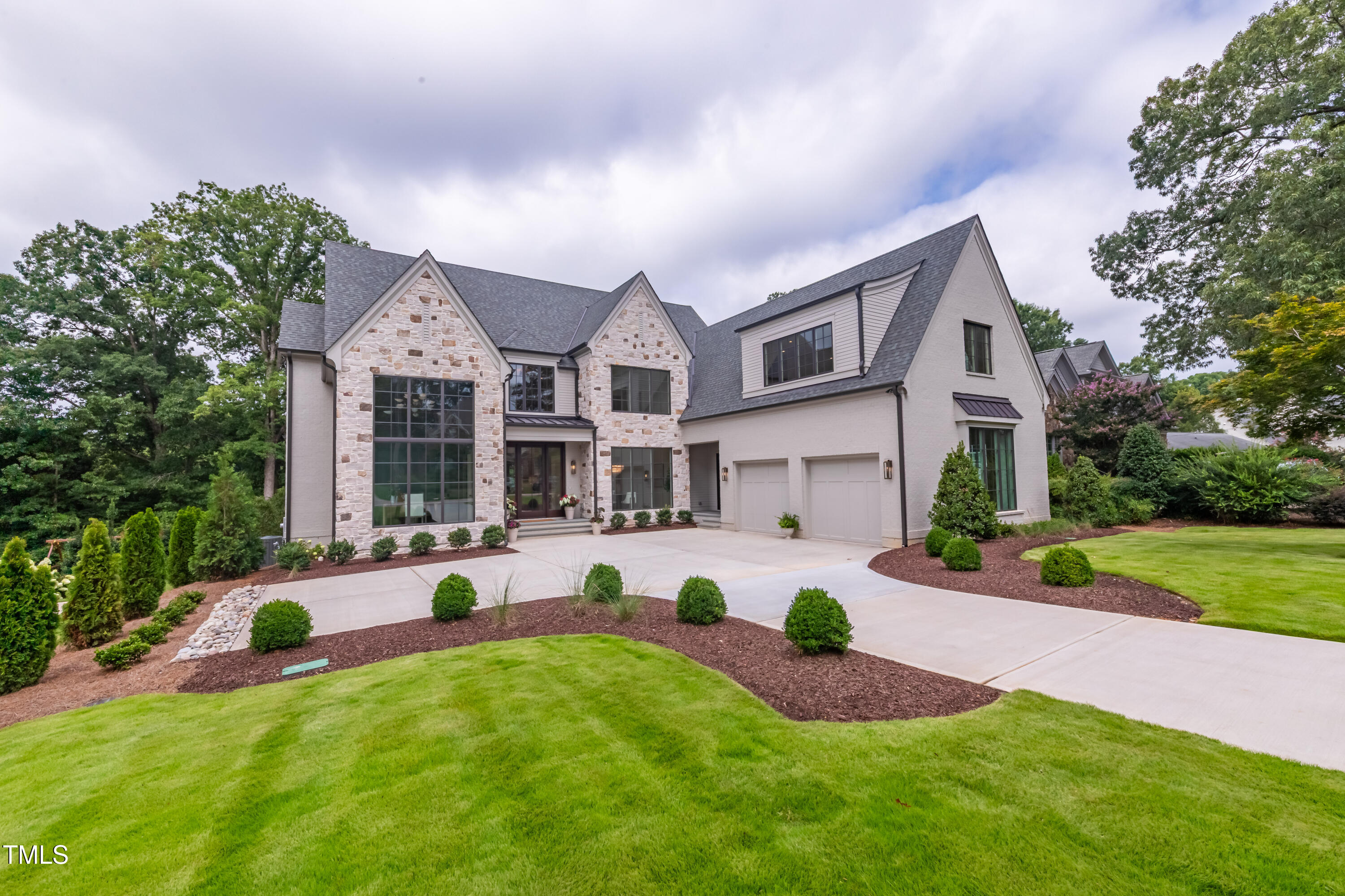 2227 Wheeler Road Raleigh, NC 27607 - Photo 2 of 56 a view of a house with a yard and sitting area