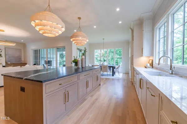a kitchen with stainless steel appliances a stove and a refrigerator