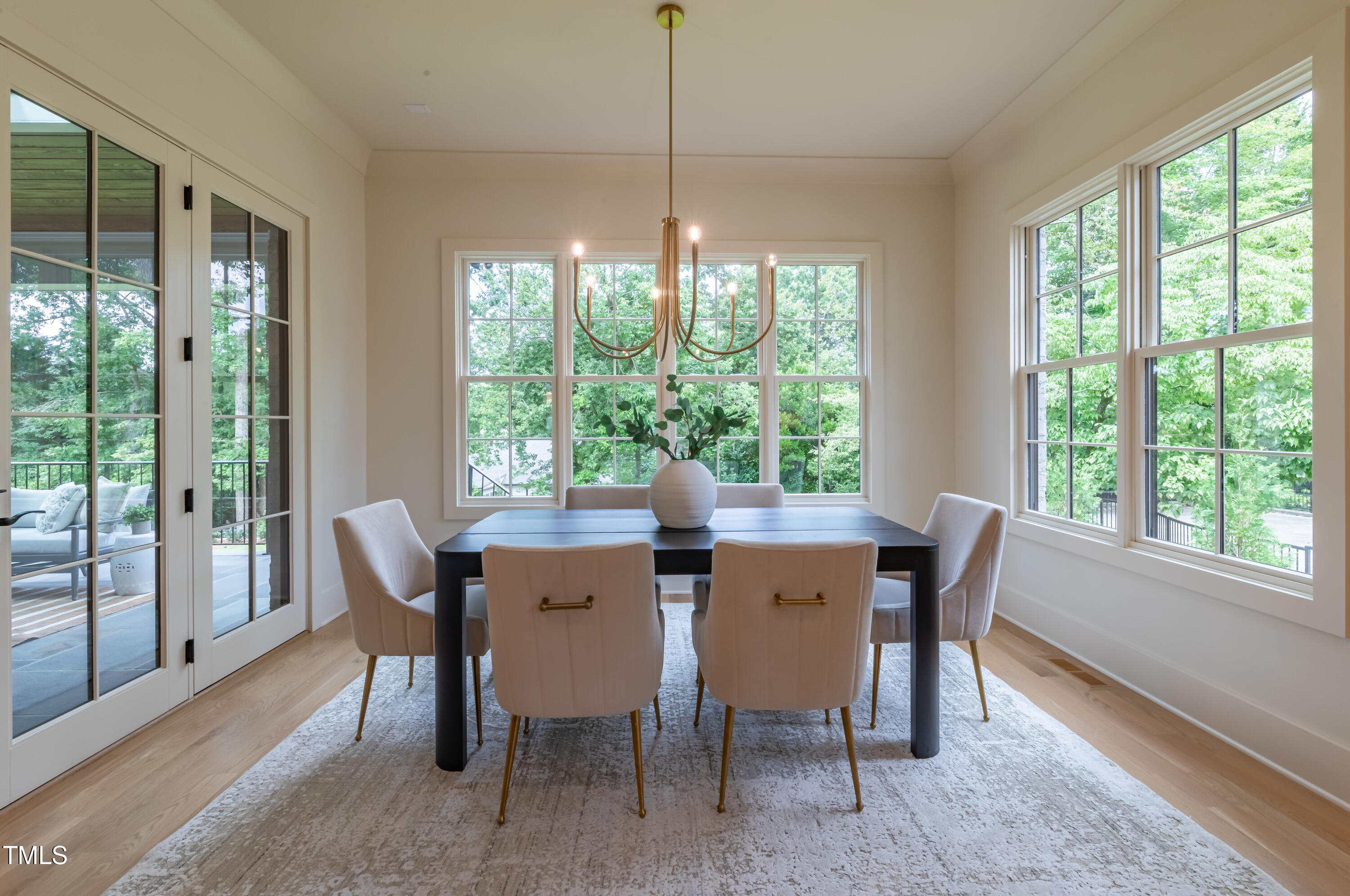 2227 Wheeler Road Raleigh, NC 27607 - Photo 25 of 56 a view of a dining room with furniture window and outside view