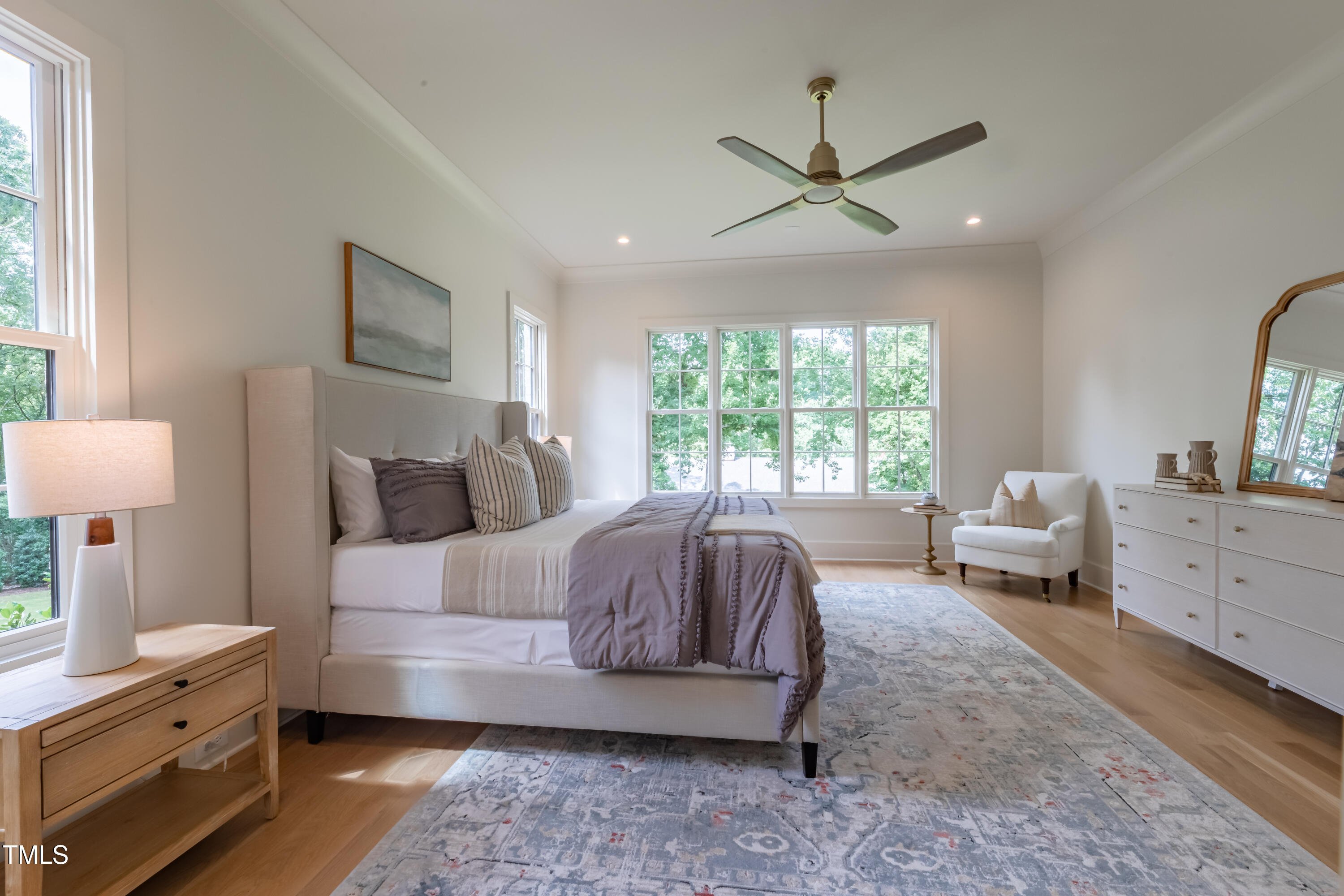 2227 Wheeler Road Raleigh, NC 27607 - Photo 33 of 56 a spacious bedroom with a bed and a dresser