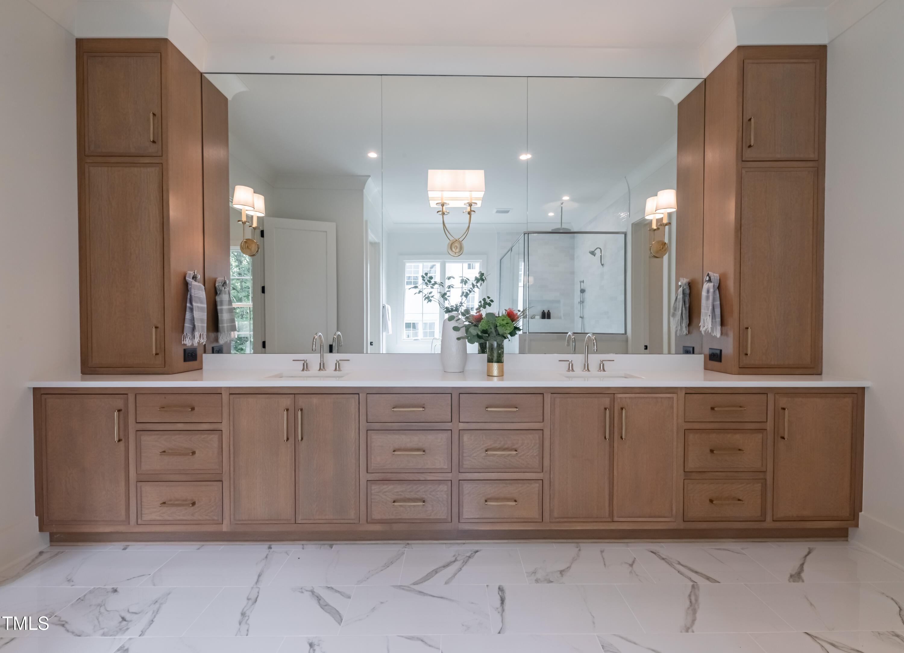 2227 Wheeler Road Raleigh, NC 27607 - Photo 36 of 56 a spacious bathroom with a granite countertop double vanity sink and a mirror