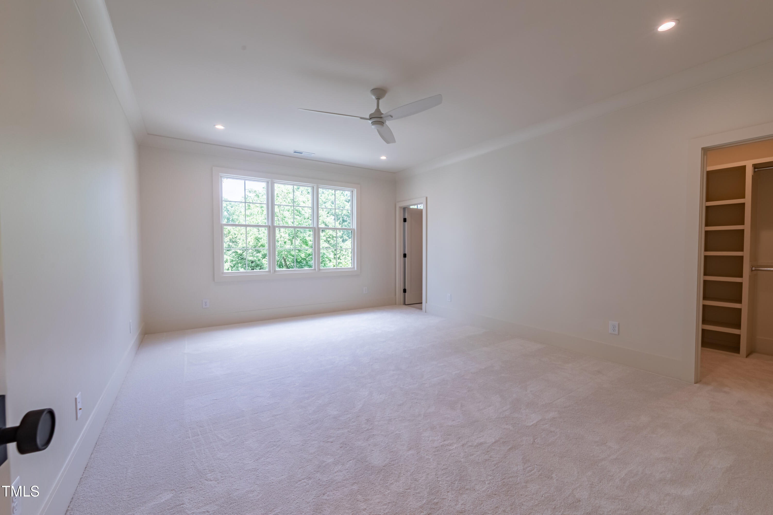 2227 Wheeler Road Raleigh, NC 27607 - Photo 42 of 56 an empty room with windows and closet