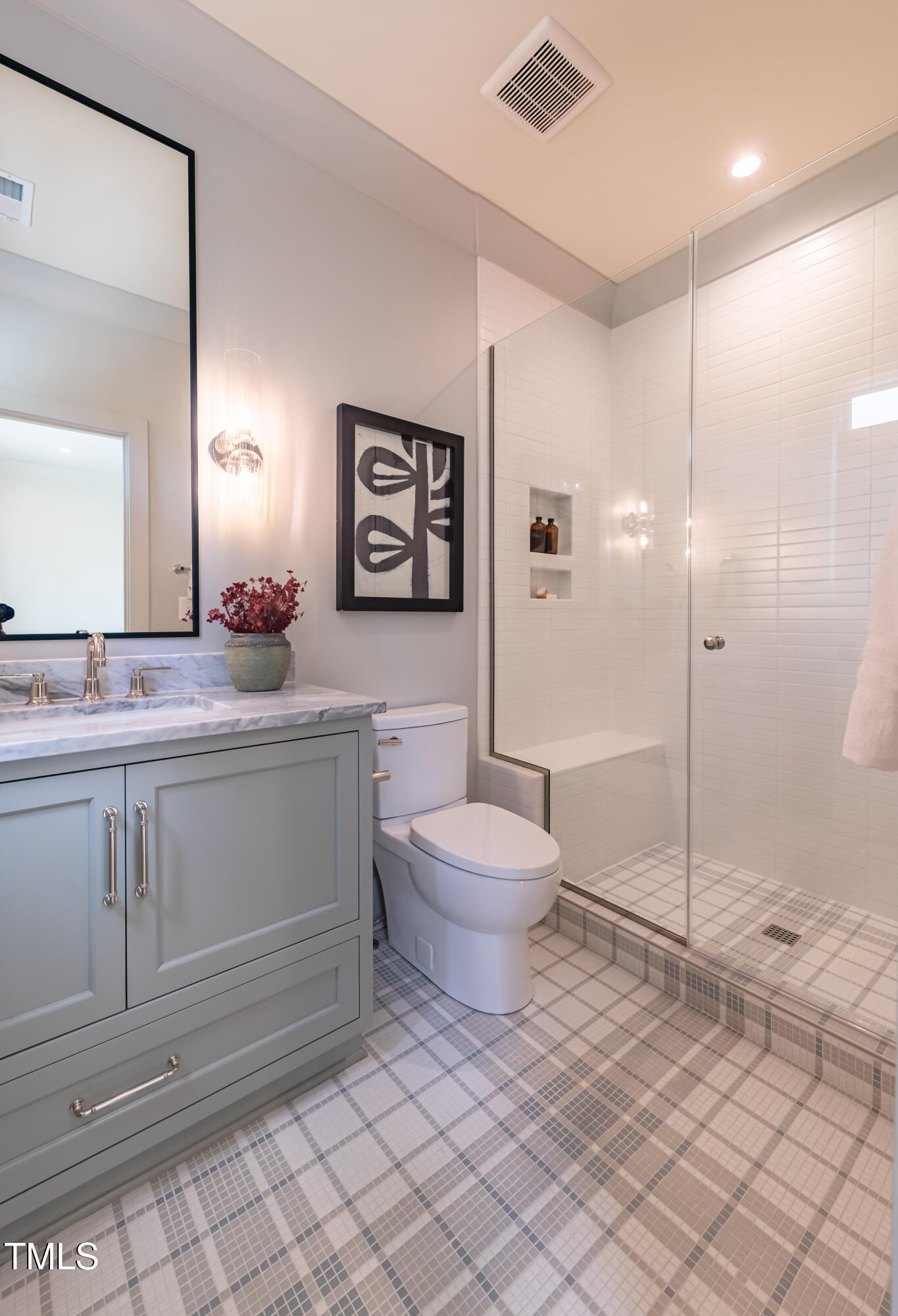 2227 Wheeler Road Raleigh, NC 27607 - Photo 43 of 56 a bathroom with a toilet sink and shower