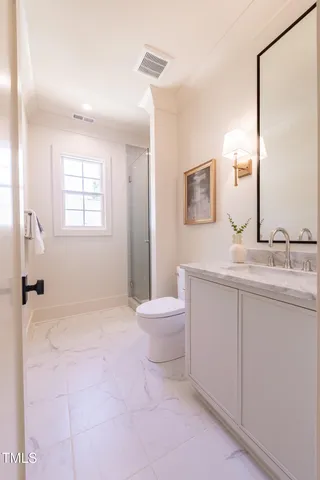 a view of house with a yard