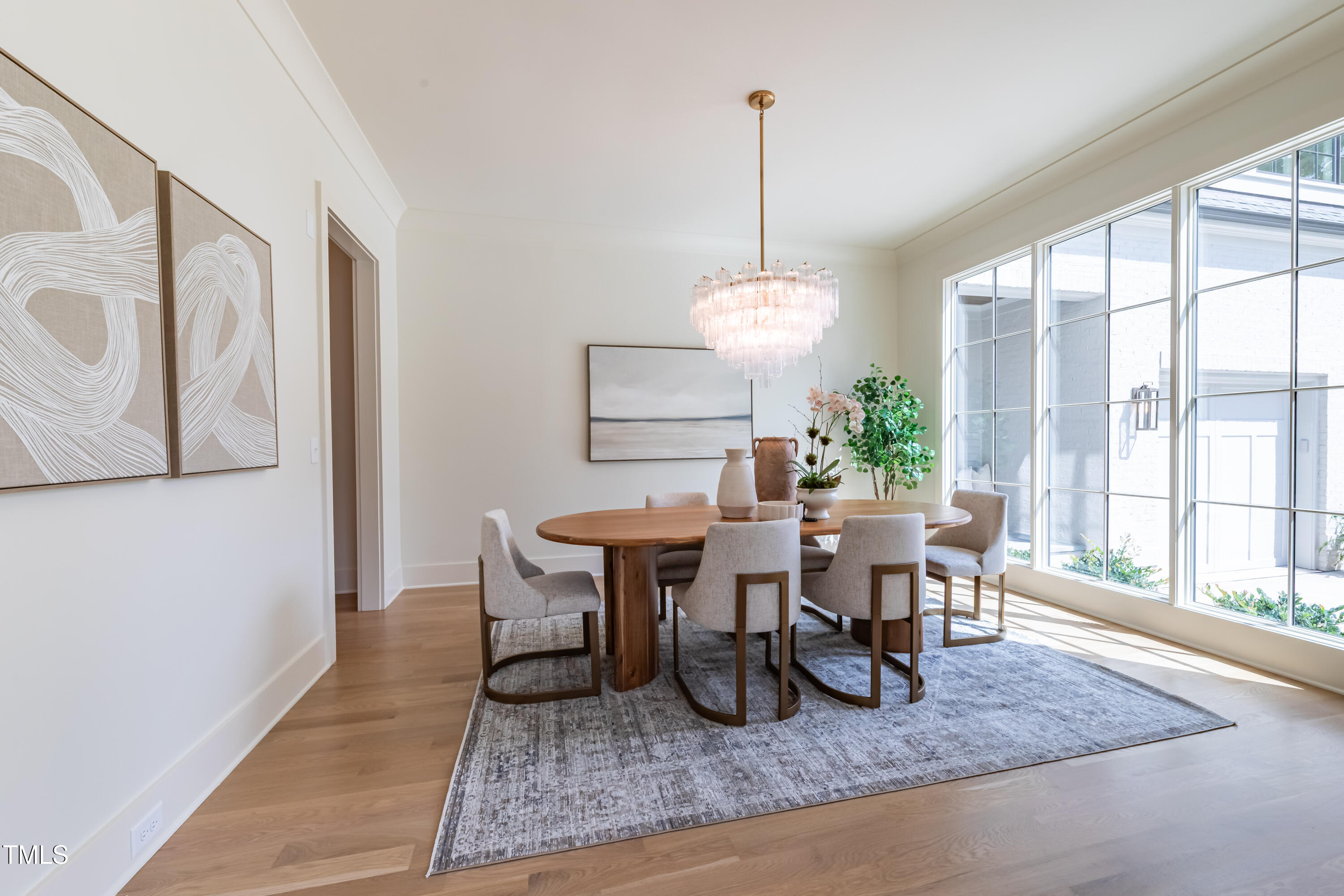 2227 Wheeler Road Raleigh, NC 27607 - Photo 5 of 56 a view of a dining room with furniture window and wooden floor