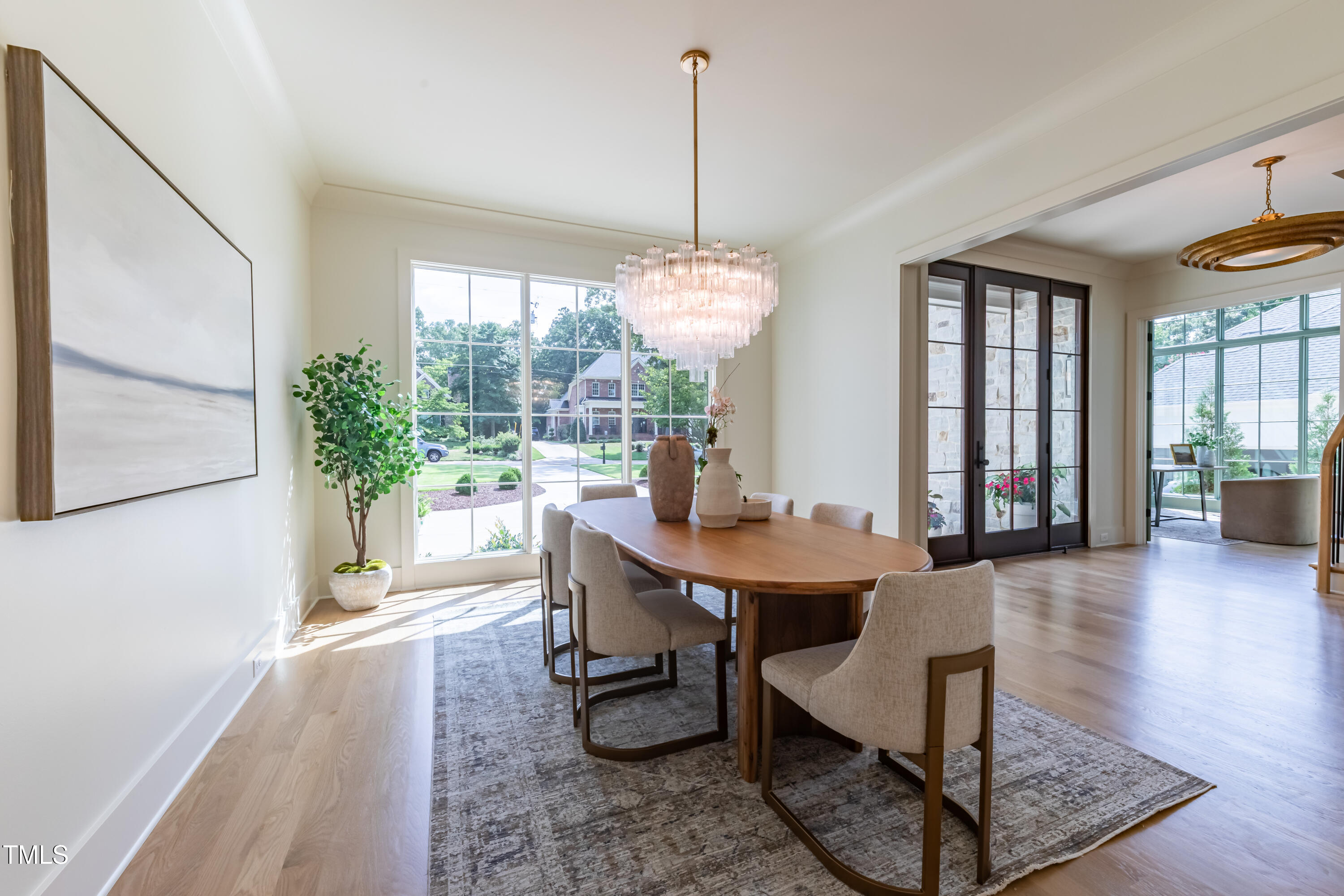 2227 Wheeler Road Raleigh, NC 27607 - Photo 6 of 56 a view of a dining room with furniture window and wooden floor