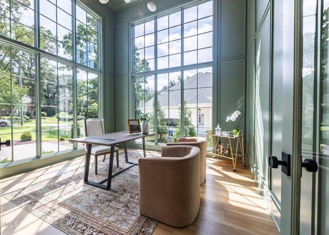 a living room with furniture and a gate
