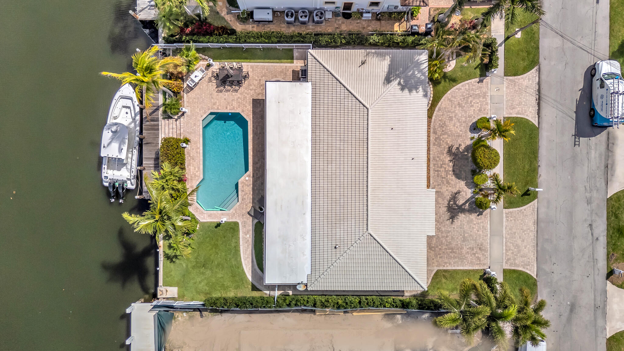 4920 Northeast 28th Avenue Lighthouse Point, FL 33064 - Photo 2 of 38 an aerial view of a house with a swimming pool