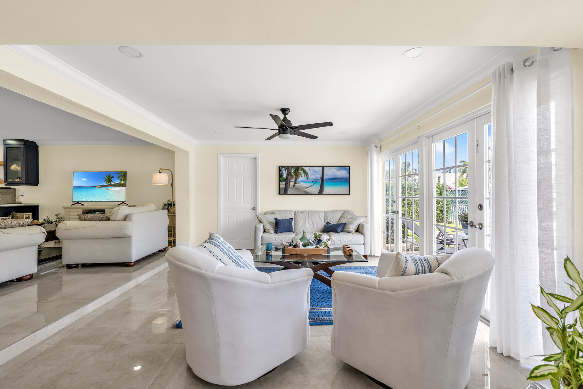 4920 Northeast 28th Avenue Lighthouse Point, FL 33064 - Photo 23 of 38 a living room with furniture and a large window