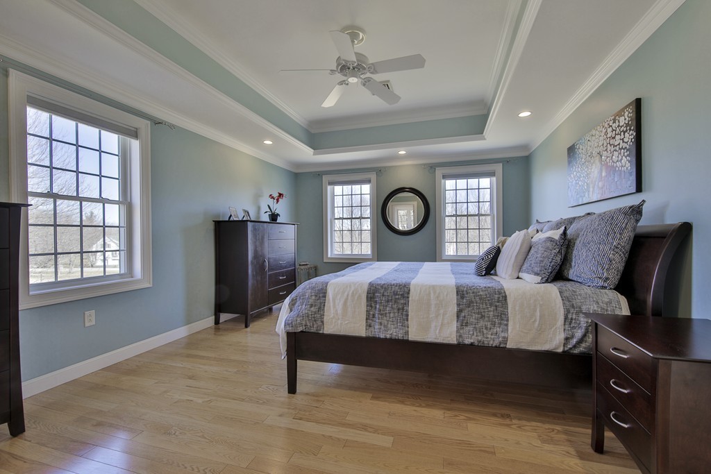 26 Old Farm Road Lunenburg, MA 01462 - Photo 18 of 30 a spacious bedroom with a bed and window