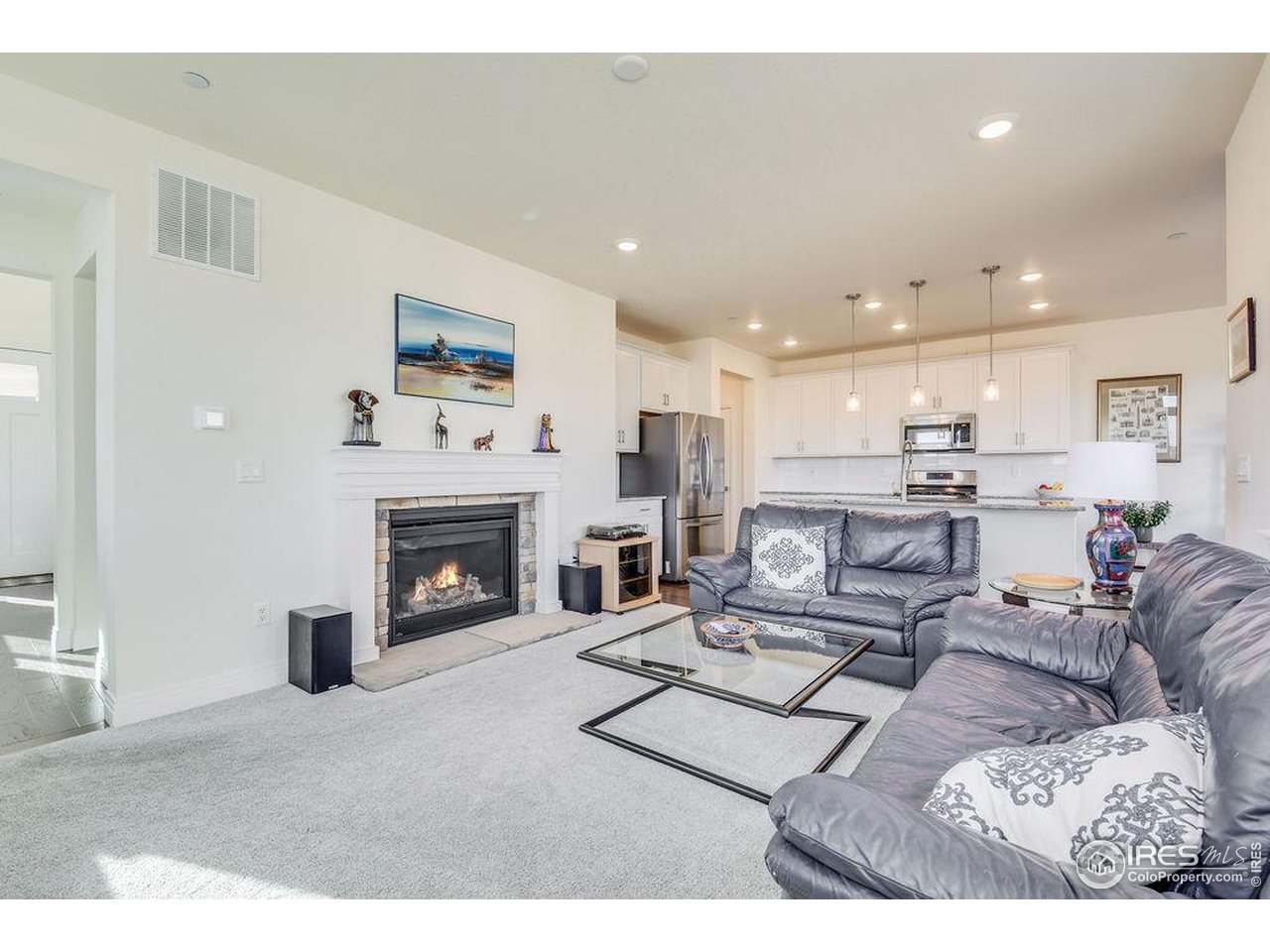 1102 Kitty Hawk Court Fort Collins, CO 80526 - Photo 7 of 37 Gas fireplace and 9 ft ceilings on the main level