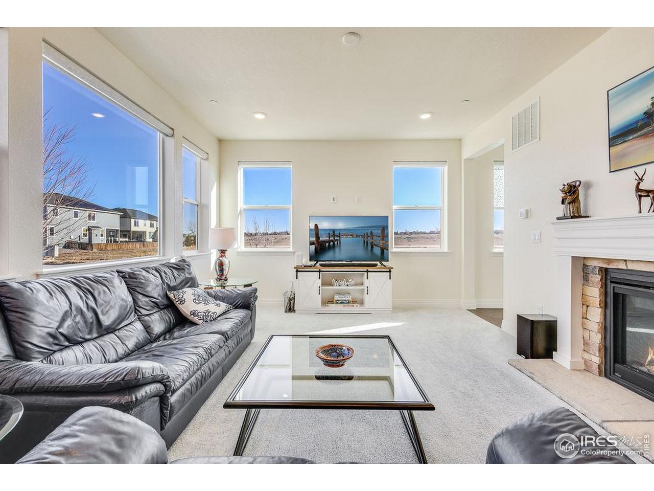 1102 Kitty Hawk Court Fort Collins, CO 80526 - Photo 8 of 37 Tons of large windows and flooded with natural light
