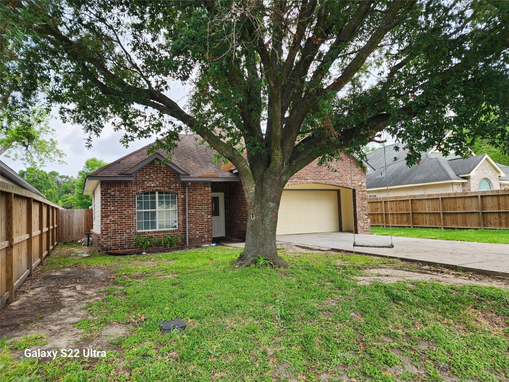 1926 Wavell Street Houston, TX 77088 - Photo 3 of 19 a front view of house with yard and green space