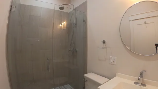 a bathroom with a sink and mirror