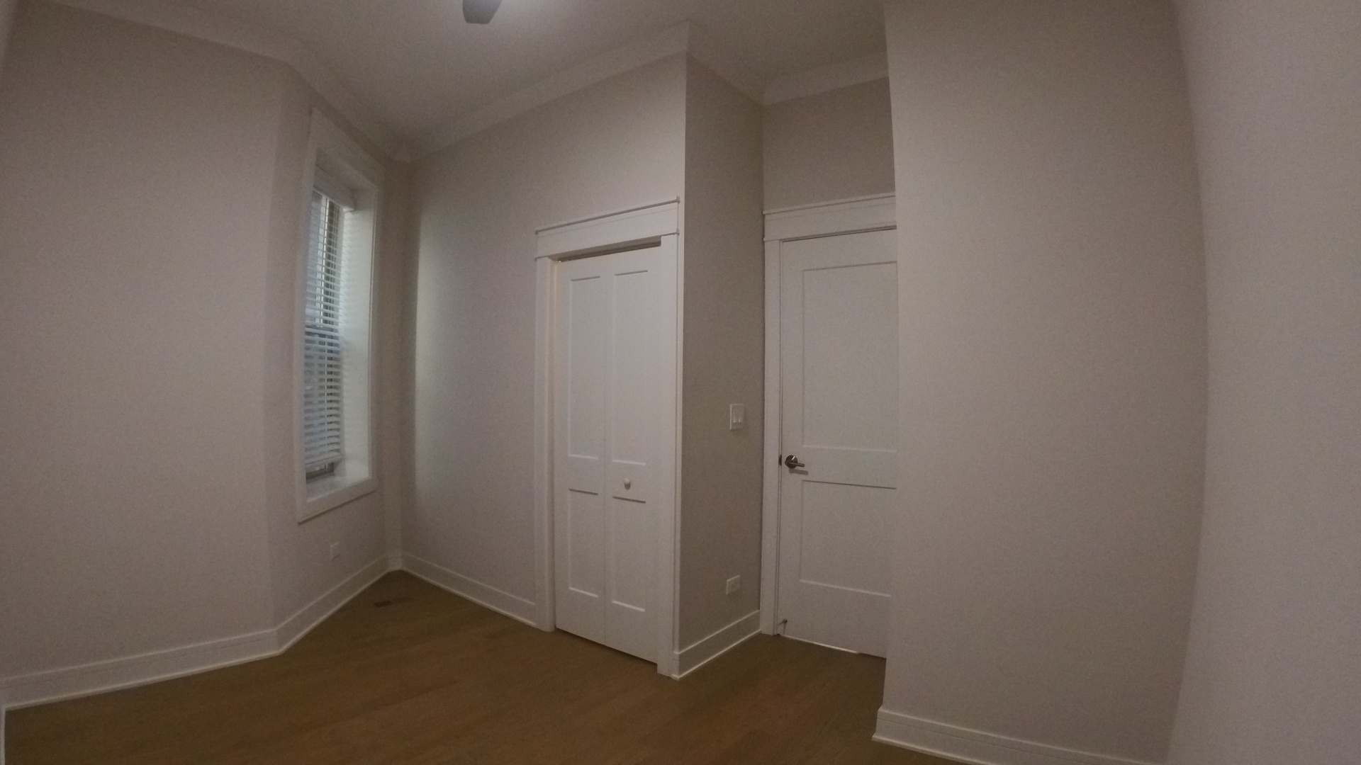 1215 West Erie Street, Unit 1 Chicago, IL 60642 - Photo 13 of 24 an empty room with windows