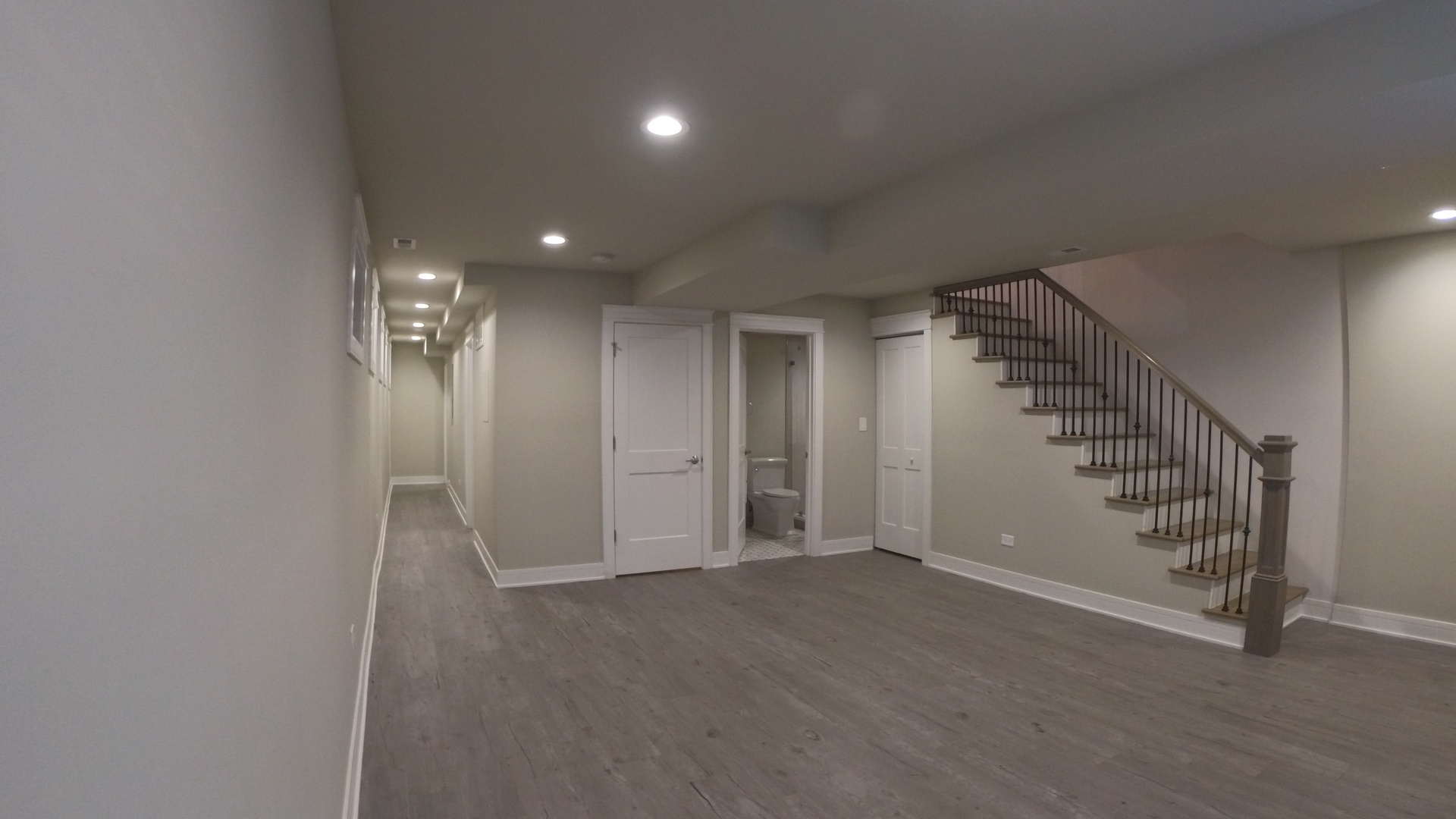 1215 West Erie Street, Unit 1 Chicago, IL 60642 - Photo 16 of 24 a view of an empty room with stairs