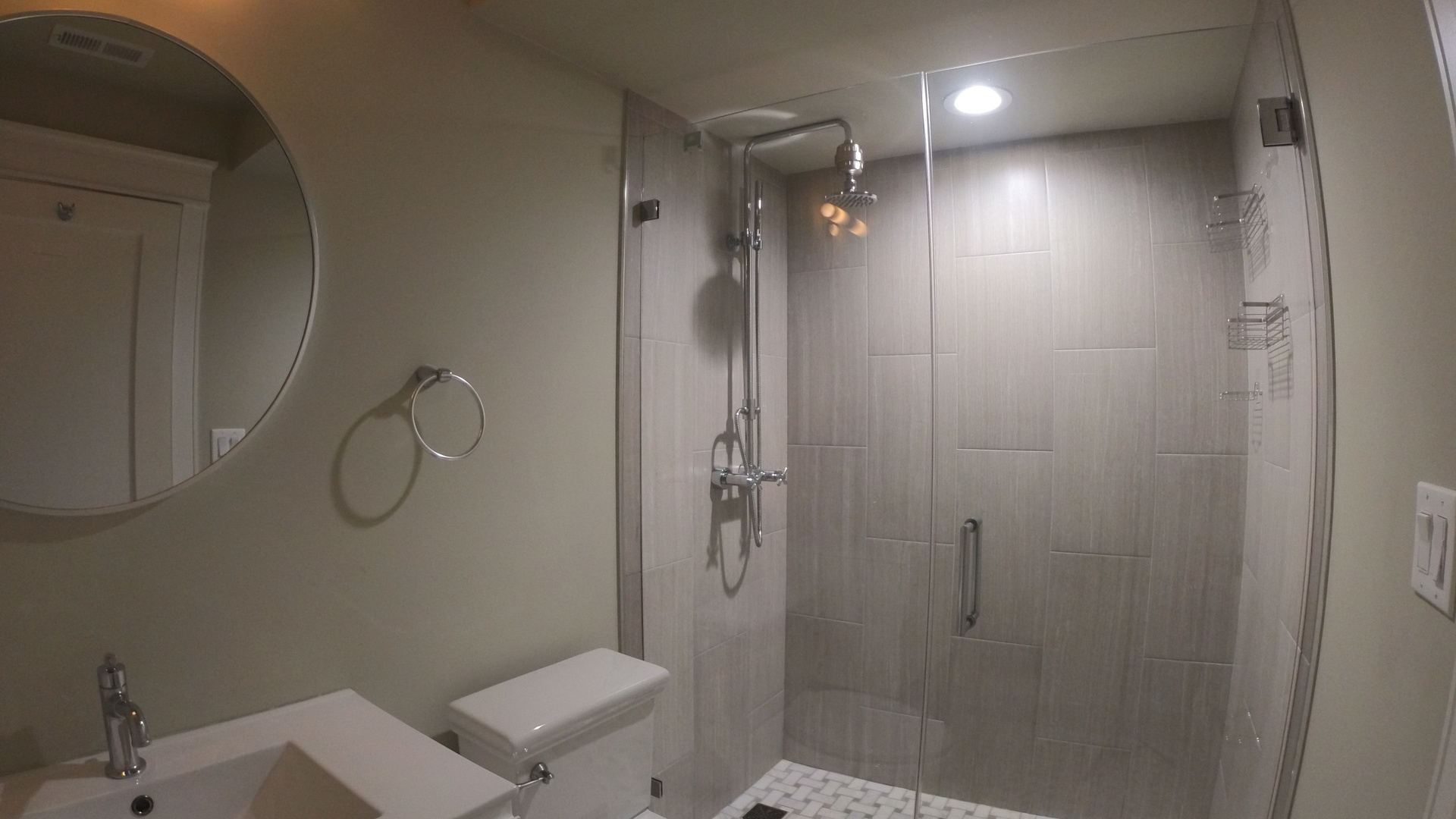 1215 West Erie Street, Unit 1 Chicago, IL 60642 - Photo 17 of 24 a bathroom with a shower and toilet