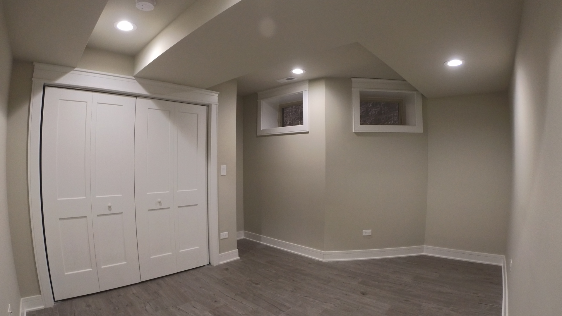 1215 West Erie Street, Unit 1 Chicago, IL 60642 - Photo 19 of 24 an empty room with wooden floor and closet