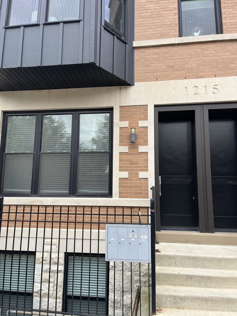 1215 West Erie Street, Unit 1 Chicago, IL 60642 - Photo 2 of 24 a view of a building entrance