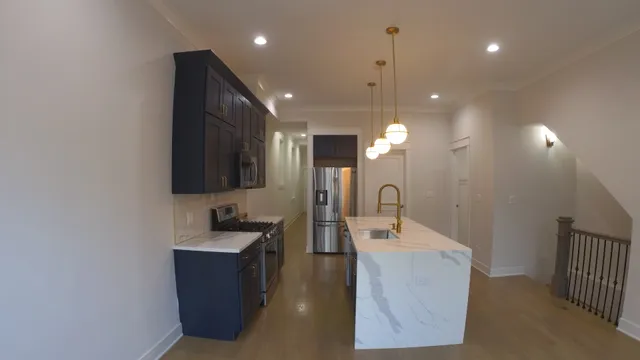 a bathroom with a double vanity sink a mirror and a shower