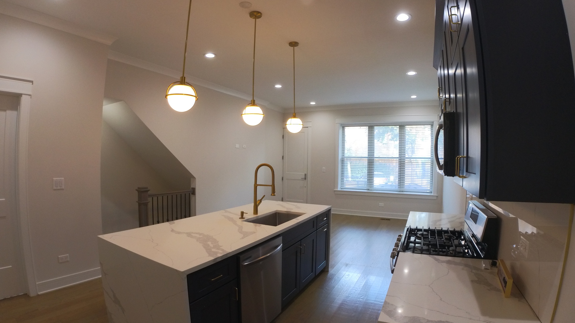 1215 West Erie Street, Unit 1 Chicago, IL 60642 - Photo 8 of 24 a kitchen with a sink and stove