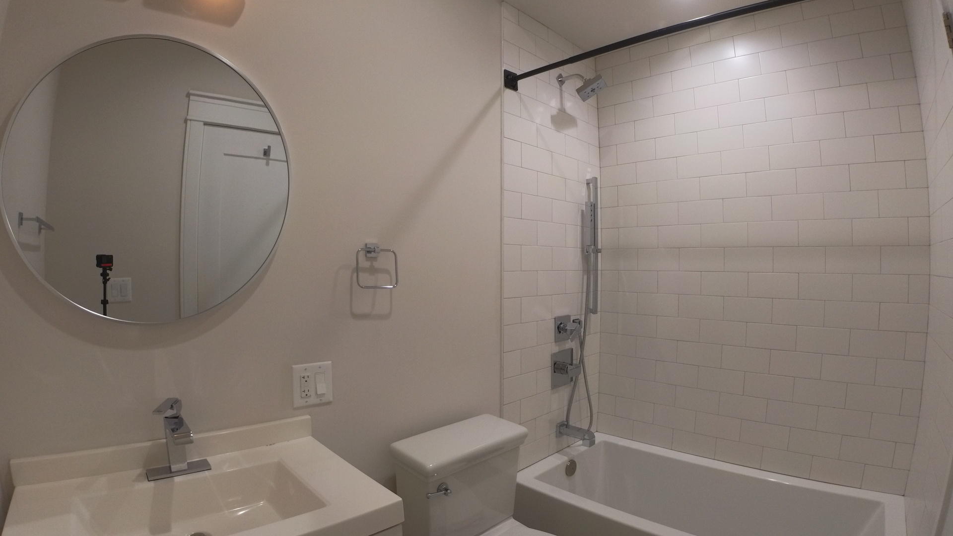 1215 West Erie Street, Unit 1 Chicago, IL 60642 - Photo 10 of 24 a bathroom with a sink and a mirror