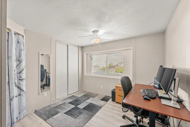 a workspace with furniture and wooden floor
