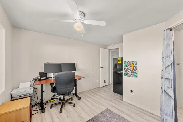 a bathroom with a double vanity sink and a window