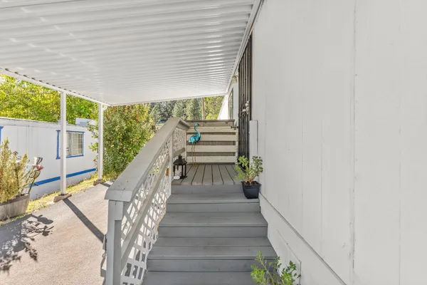 a view of entryway with wooden floor