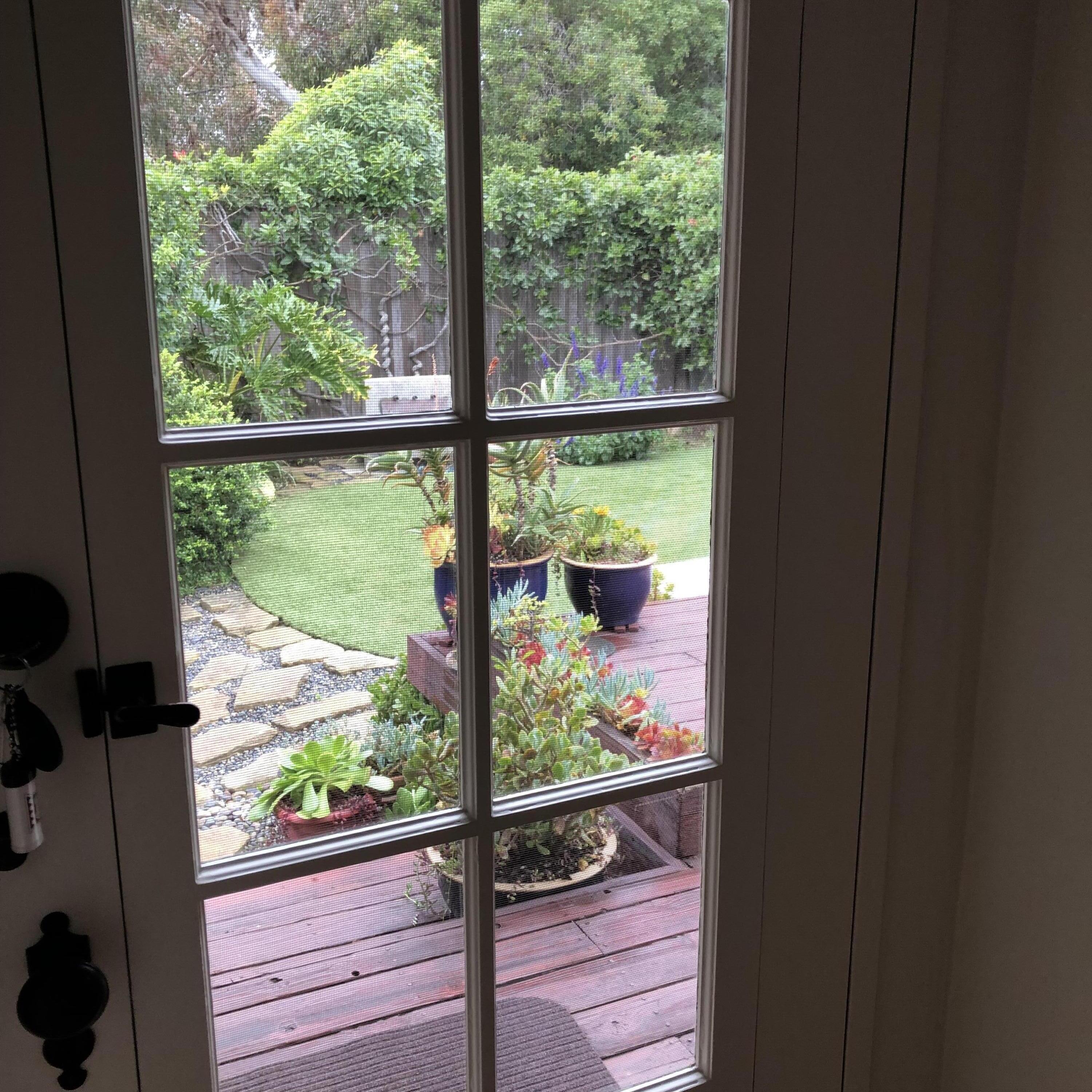 179 Hermosillo Road Santa Barbara, CA 93108 - Photo 27 of 64 Looking out back door through hallway.