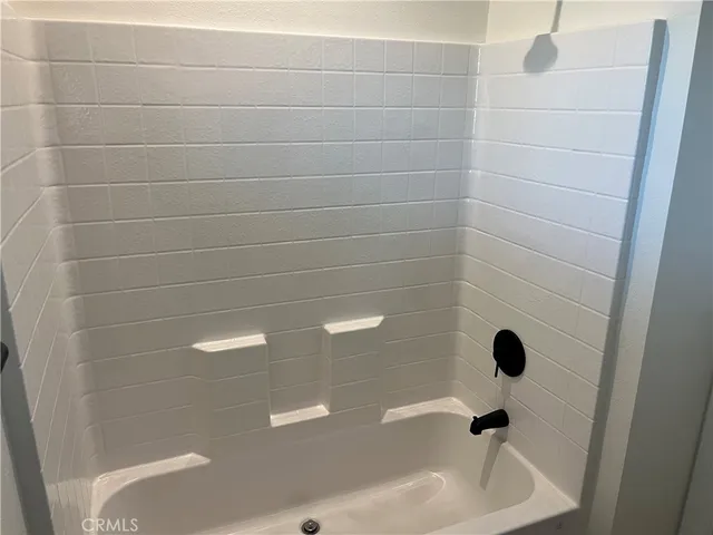 a bathroom with a bathtub
