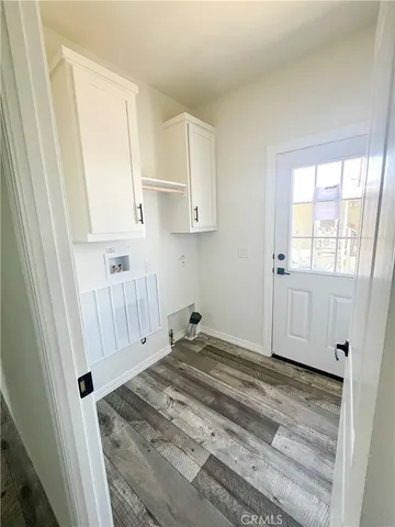 a view of a closet in an empty room