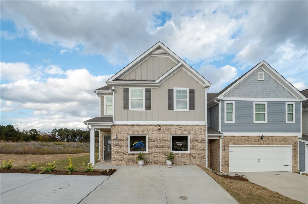 7443 Knoll Hollow Road Lithonia, GA 30058 - Photo 2 of 46 a view of house and yard with green space
