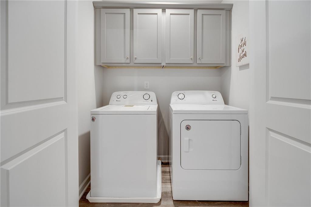 7443 Knoll Hollow Road Lithonia, GA 30058 - Photo 36 of 46 a utility room with dryer and washer