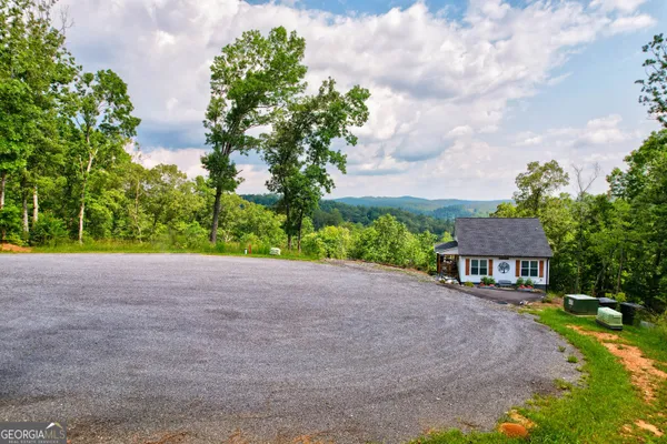 a house with yard in front of it